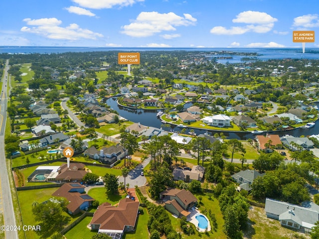 birds eye view of property featuring a water view