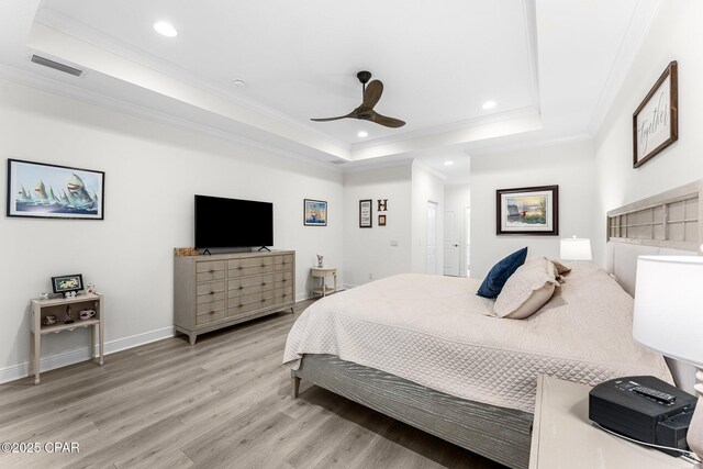 sitting room with light wood-type flooring and ornamental molding