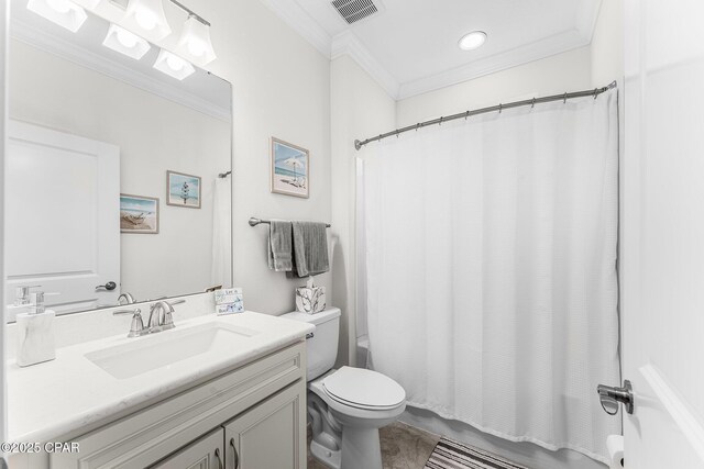 bathroom featuring toilet, wood-type flooring, ceiling fan, and crown molding