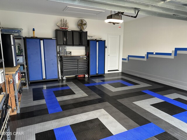 laundry room featuring ornamental molding and stacked washer / dryer