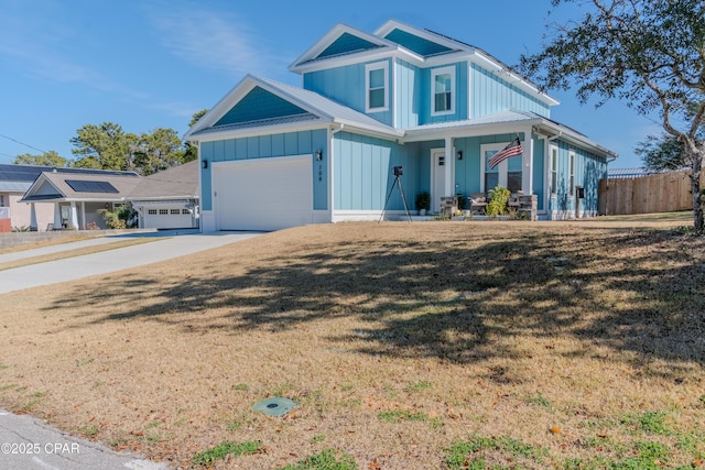 craftsman inspired home featuring a garage, covered porch, and a front lawn