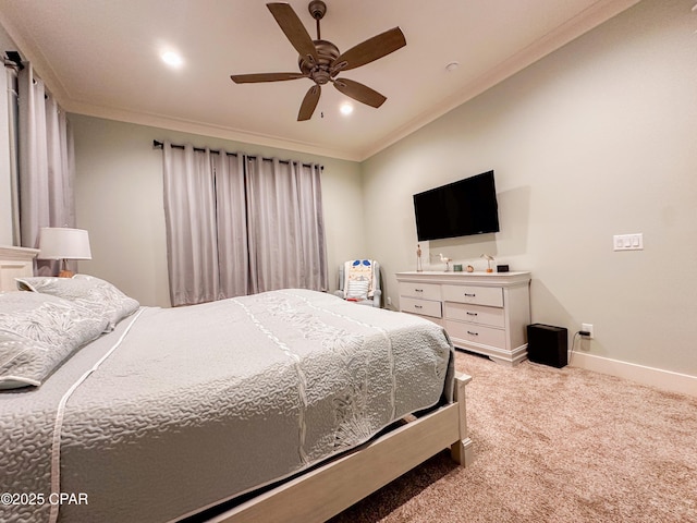 carpeted bedroom with crown molding and ceiling fan