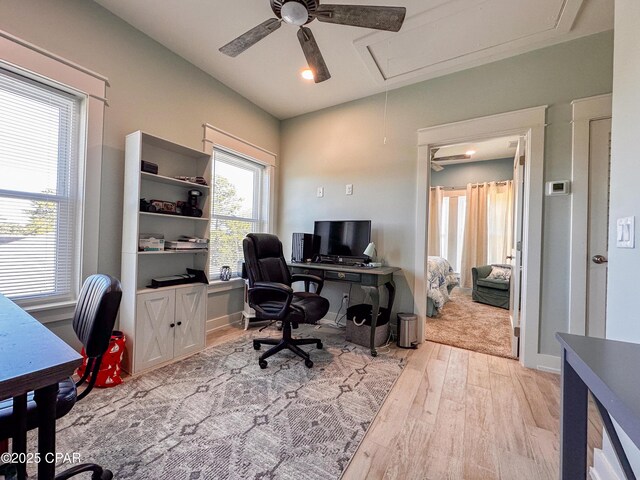 home office featuring ceiling fan and light wood-type flooring