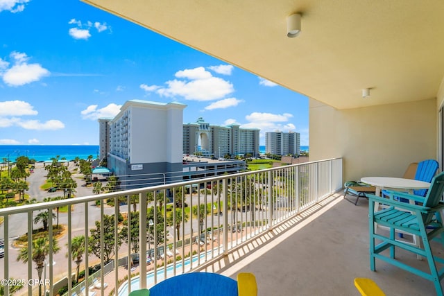 balcony featuring a water view