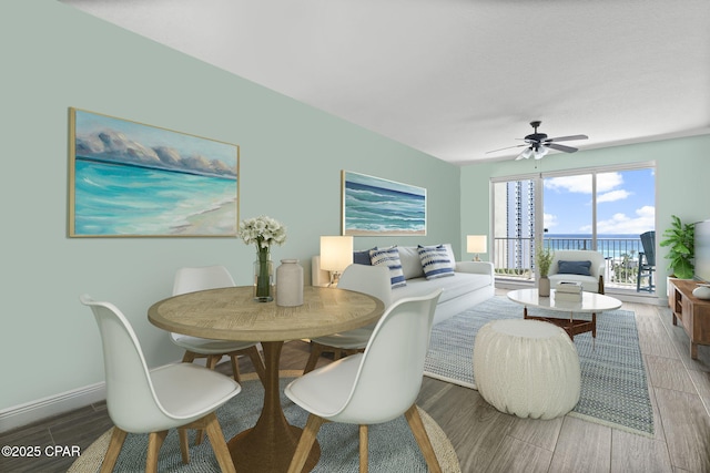 dining room featuring ceiling fan