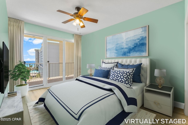 bedroom featuring access to outside, ceiling fan, and light hardwood / wood-style flooring