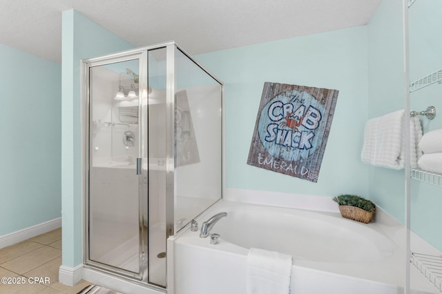 bathroom featuring separate shower and tub and tile patterned flooring