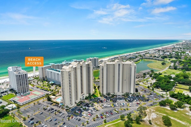 aerial view featuring a view of the beach and a water view