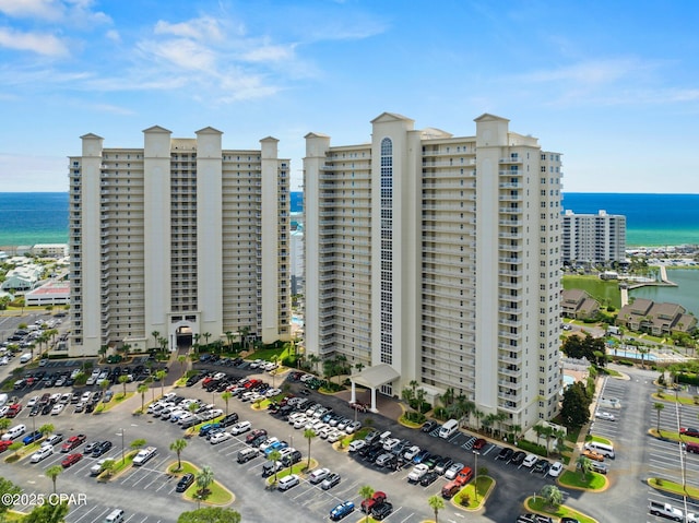 view of building exterior with a water view