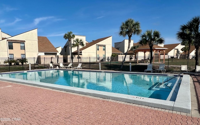 view of swimming pool with a gazebo and a patio