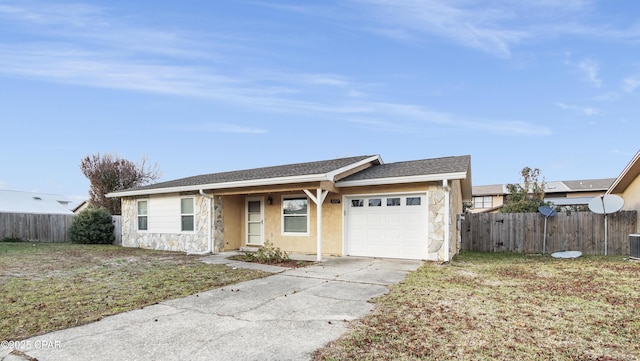 ranch-style home with a garage and a front yard