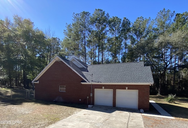 view of property exterior with a garage