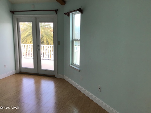 doorway to outside featuring hardwood / wood-style floors and french doors