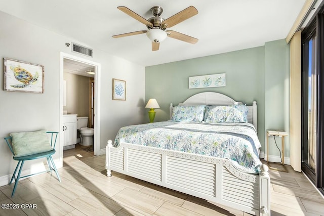 bedroom with ceiling fan and connected bathroom