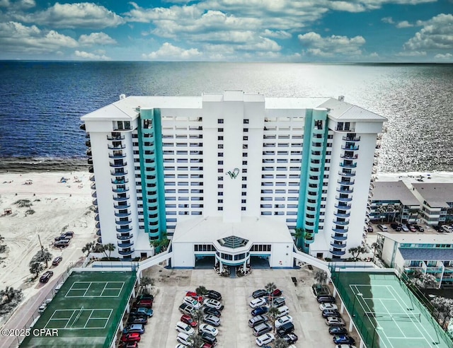 bird's eye view featuring a beach view and a water view