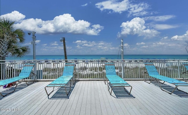 deck featuring a water view