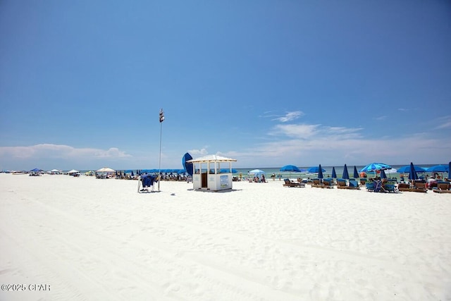 property view of water with a beach view