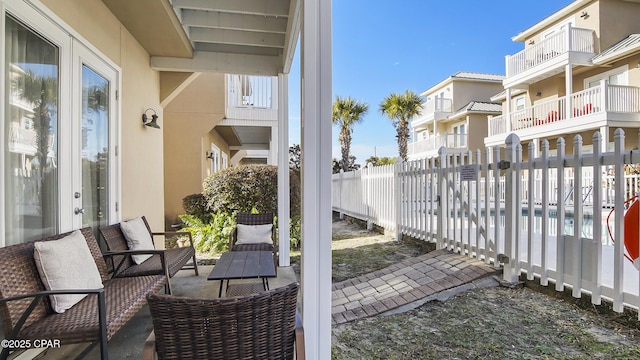 view of patio / terrace featuring a fenced in pool