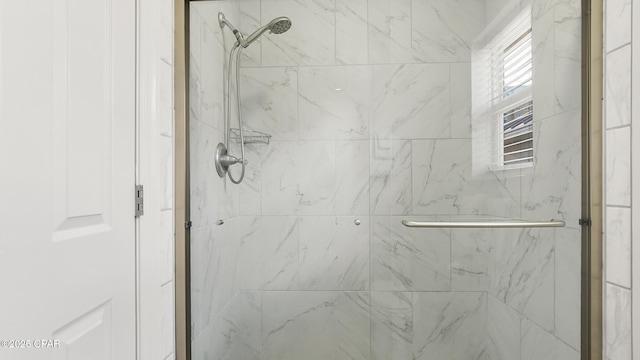 bathroom featuring an enclosed shower