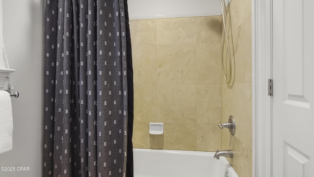 bathroom featuring shower / bath combo with shower curtain