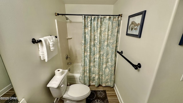 bathroom with toilet, shower / bath combo with shower curtain, and hardwood / wood-style floors