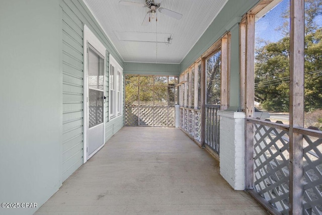 view of patio featuring ceiling fan