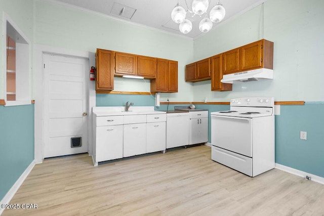 kitchen featuring a notable chandelier, pendant lighting, white appliances, light wood-type flooring, and ornamental molding