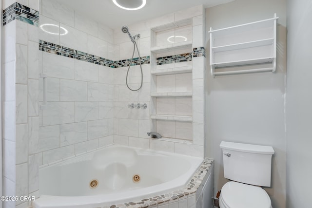 bathroom with toilet and tiled shower / bath