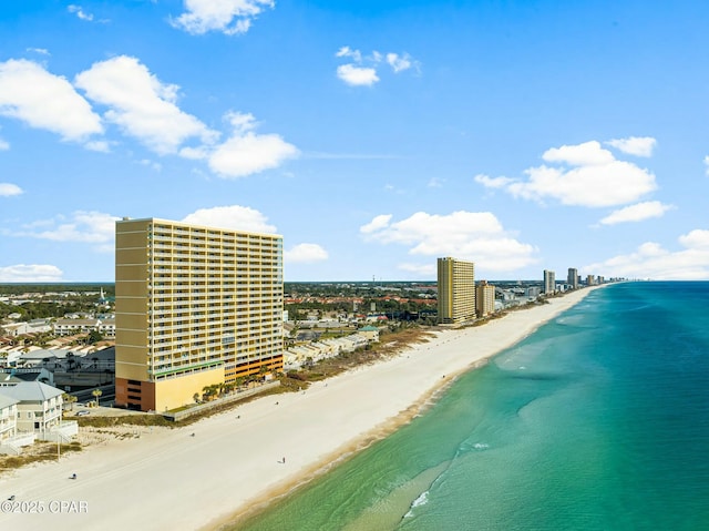 aerial view with a beach view and a water view