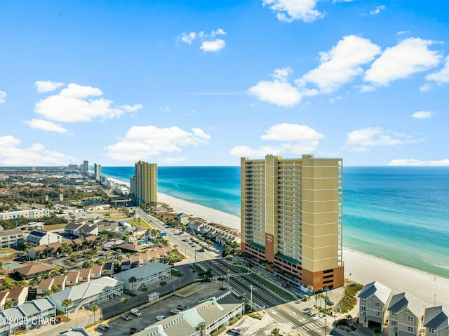 aerial view featuring a water view and a view of the beach