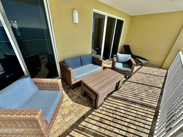 balcony featuring a patio and outdoor lounge area