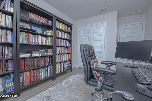 office space featuring hardwood / wood-style flooring