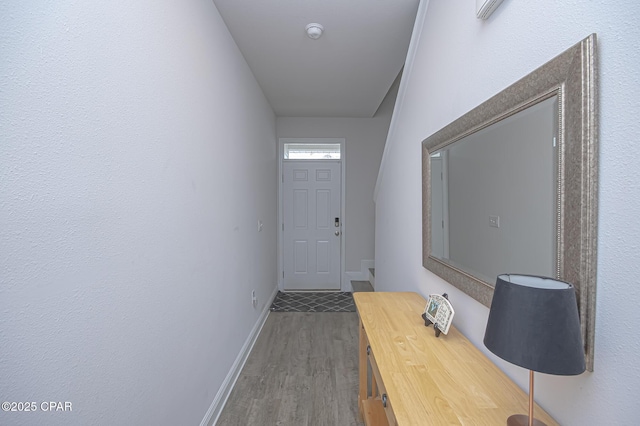 corridor with dark wood-type flooring