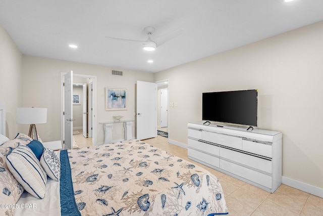 tiled bedroom with ceiling fan