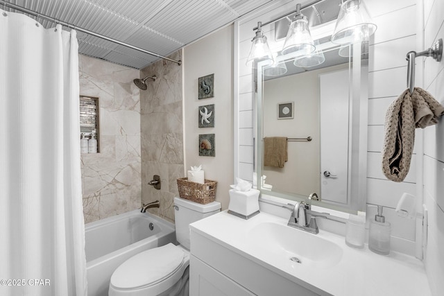 full bathroom featuring vanity, toilet, and shower / tub combo