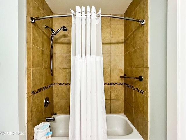 bathroom with shower / bath combo