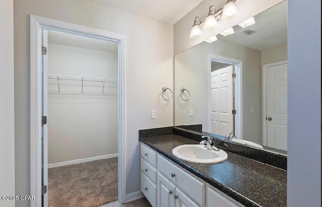 bathroom featuring vanity