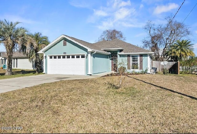 ranch-style house featuring a garage and a front lawn