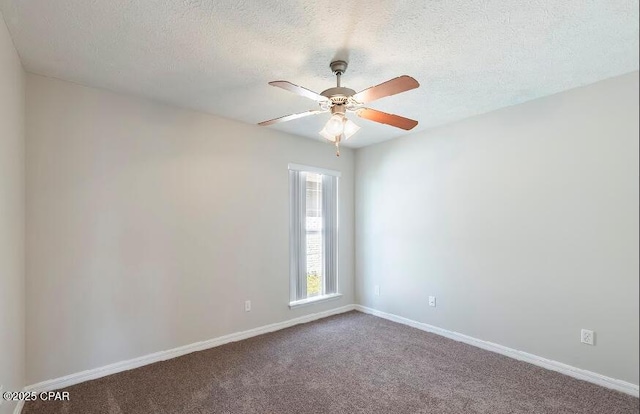 unfurnished room featuring carpet floors, ceiling fan, and a textured ceiling