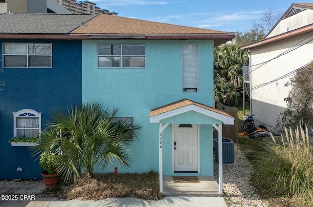 view of front of home featuring central AC unit