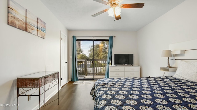 bedroom featuring access to exterior, ceiling fan, and dark hardwood / wood-style floors