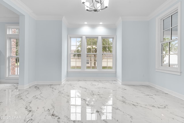 unfurnished dining area with crown molding and a chandelier