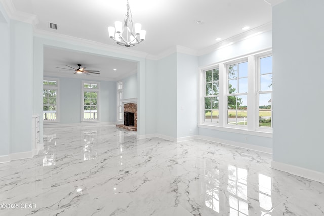 unfurnished living room with ornamental molding, a brick fireplace, and a wealth of natural light