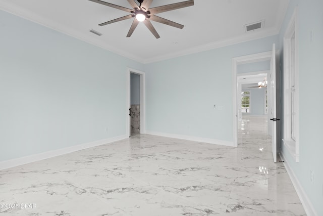 empty room with ornamental molding and ceiling fan