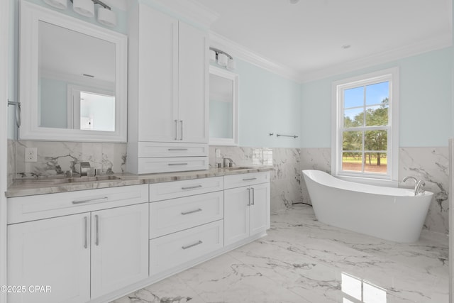 bathroom featuring vanity, tile walls, ornamental molding, and a bath