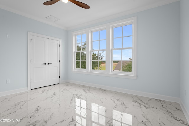 unfurnished bedroom with multiple windows, a closet, ceiling fan, and ornamental molding