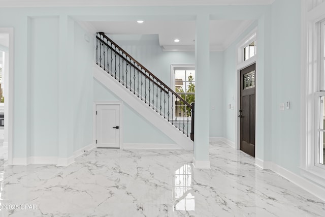 entryway with crown molding