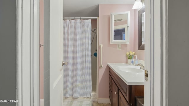 bathroom with vanity and a shower with curtain