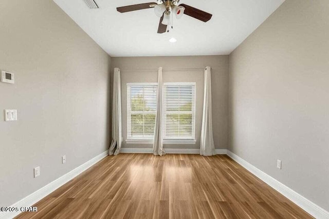 unfurnished room featuring wood-type flooring and ceiling fan