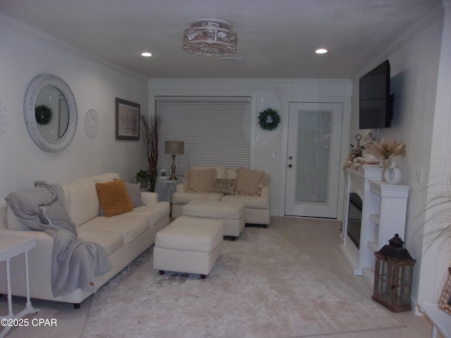 living room featuring crown molding and light carpet